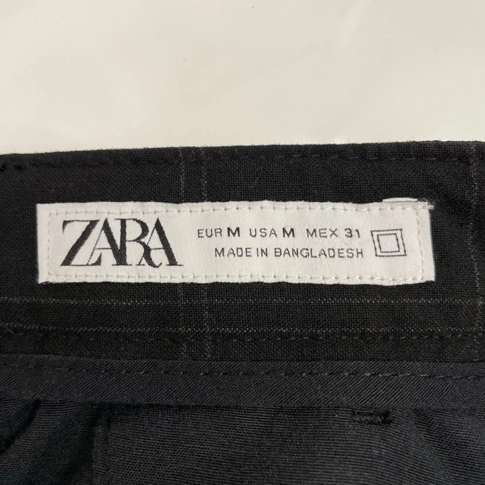 Zara woman’s black plaid trousers size medium